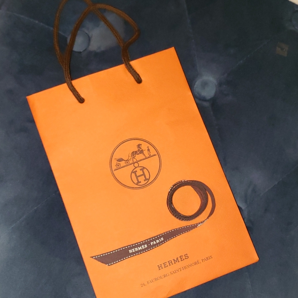 Hermes small accessory shopping bag.
